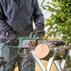 Bosch UniversalChain35 1.8W Mains Fed Corded 350mm Chainsaw -Garden - Landscaping Store bosch universalchain35 1 8w mains fed corded 350mm chainsaw4059952608167 06i bq